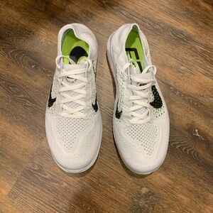 Nike Flyknit White and Black Athletic Shoes